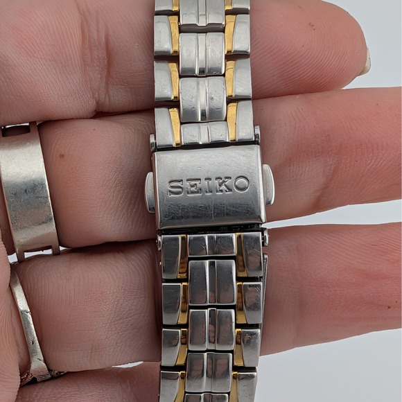 Seiko 7N82-0AG0 Blue Sunburst Two Tone Date Quartz Watch 50M main image 8